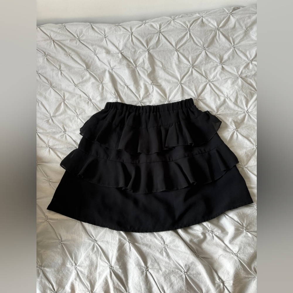 Black frilly skirt